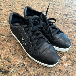 Prada women’s sneakers, black, size 39 (fits 9). Excellent condition.